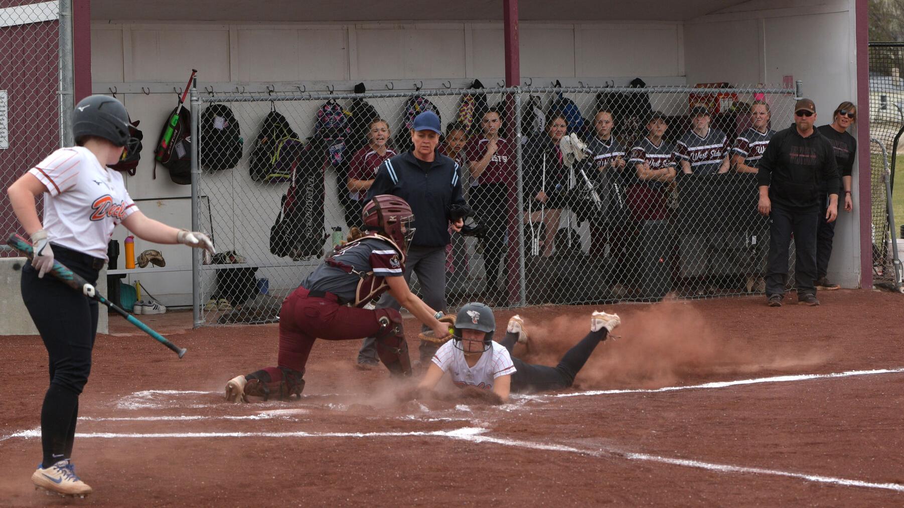 West Side girls pick up first win